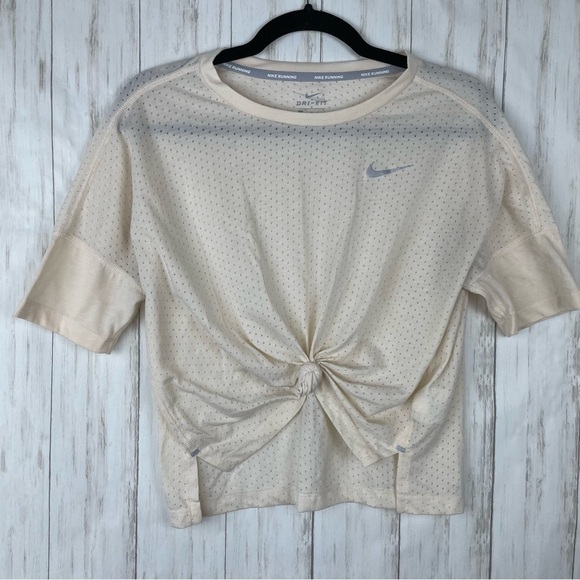 Nike cream medium perforated running crop top - Picture 1 of 5